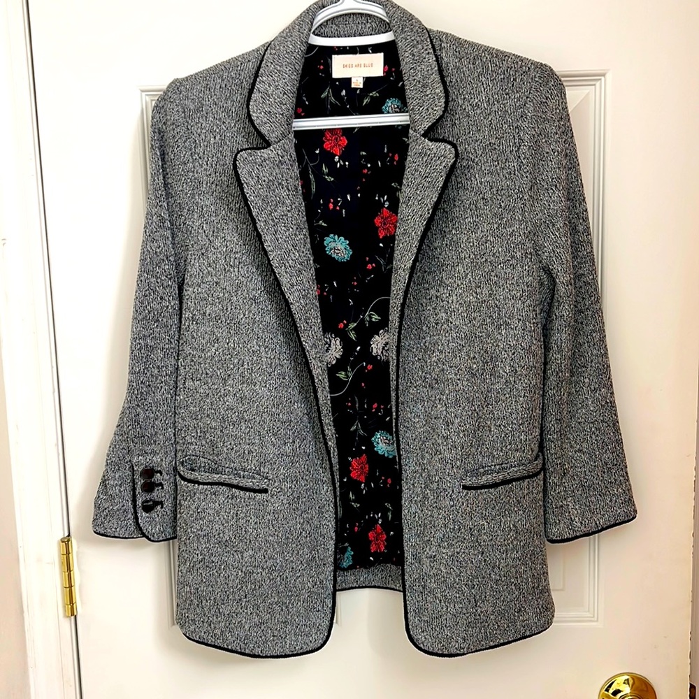 Gray and black skies are blue blazer in size small. Like new.